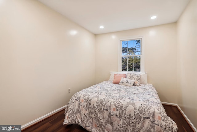 bedroom featuring dark hardwood / wood-style floors