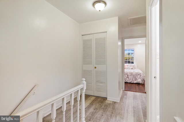 hallway featuring light hardwood / wood-style floors