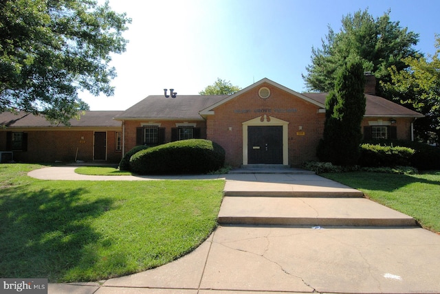 ranch-style house with a front yard