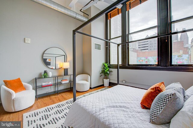 bedroom featuring hardwood / wood-style flooring