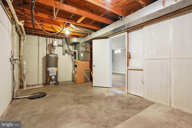 basement with heating unit and gas water heater