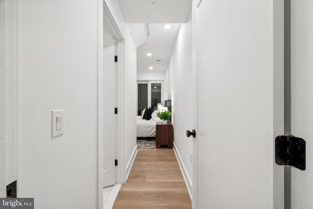 corridor featuring light hardwood / wood-style flooring