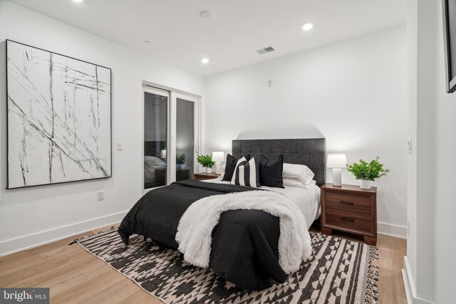 bedroom with light wood-type flooring