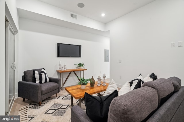 living room with light hardwood / wood-style flooring