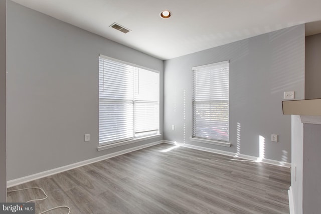 unfurnished living room with light wood-type flooring