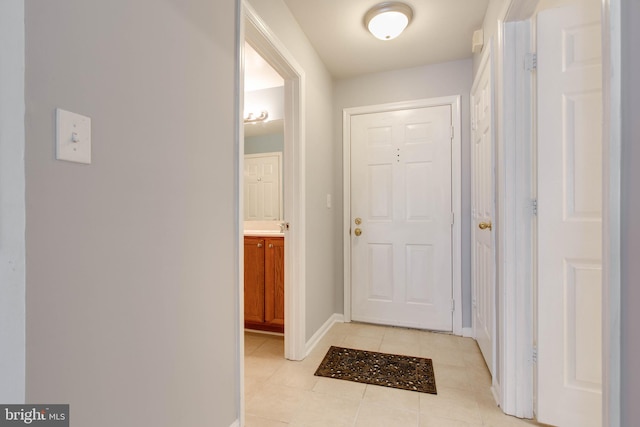 entryway featuring light tile patterned floors