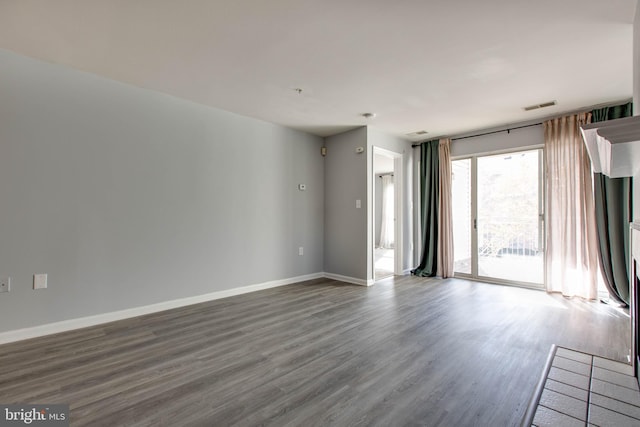 empty room featuring wood-type flooring