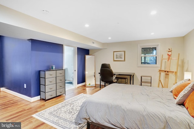 bedroom featuring light hardwood / wood-style floors