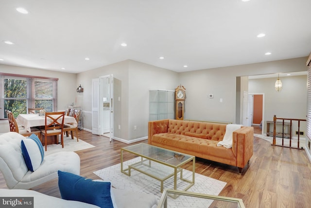 living room with light hardwood / wood-style flooring