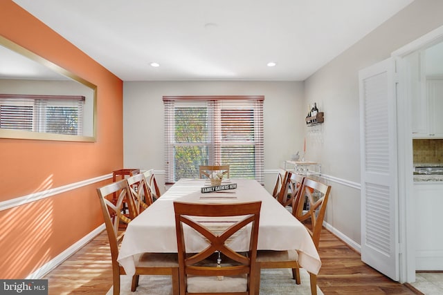 dining area featuring light wood-type flooring