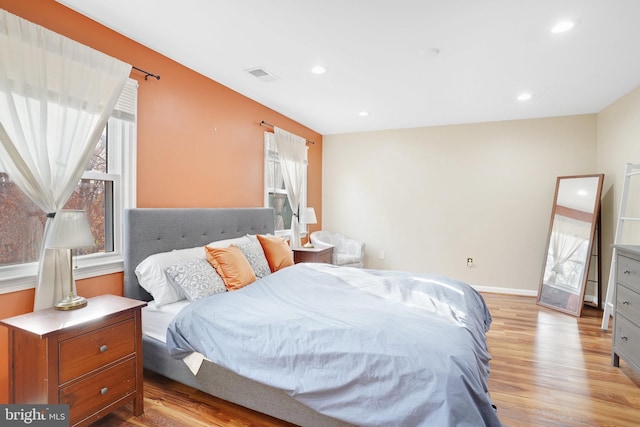 bedroom featuring light hardwood / wood-style floors