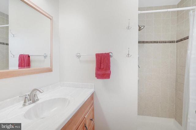 bathroom featuring vanity and walk in shower