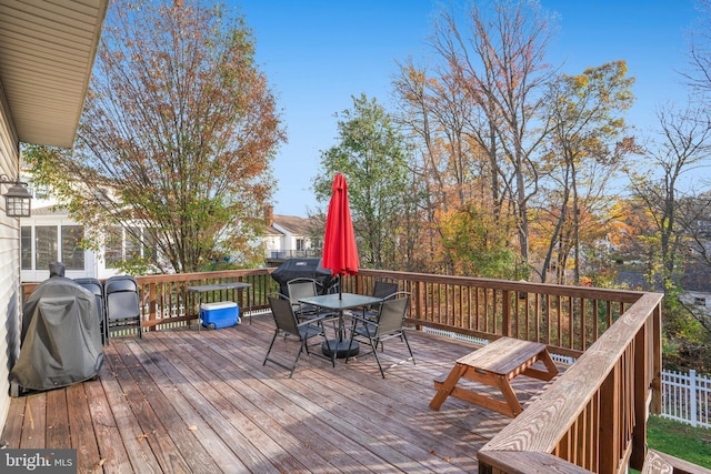 wooden deck featuring grilling area