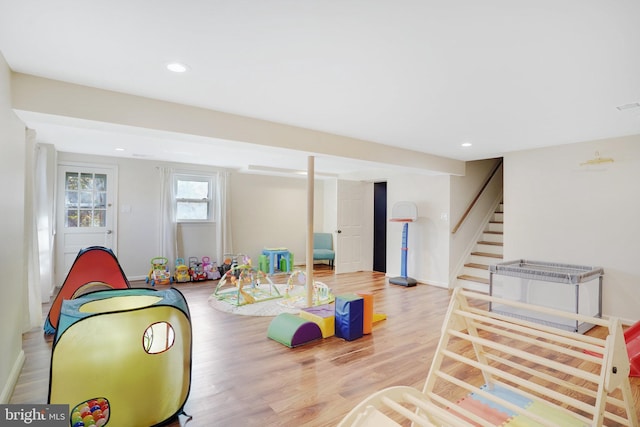 playroom with hardwood / wood-style floors