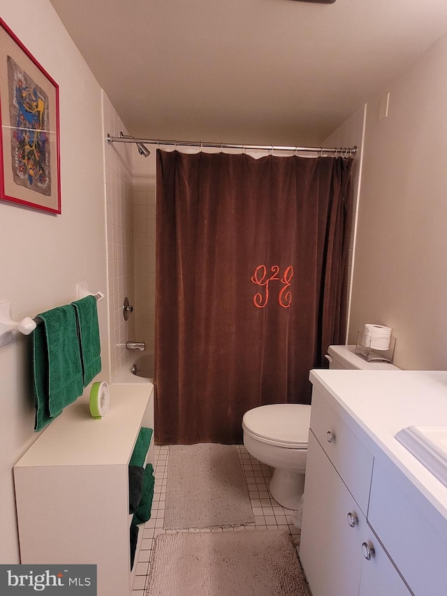 full bathroom featuring vanity, tile patterned flooring, toilet, and shower / bath combination with curtain