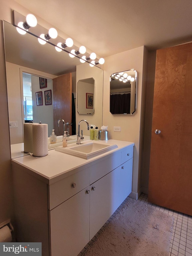 bathroom featuring vanity and tile patterned floors