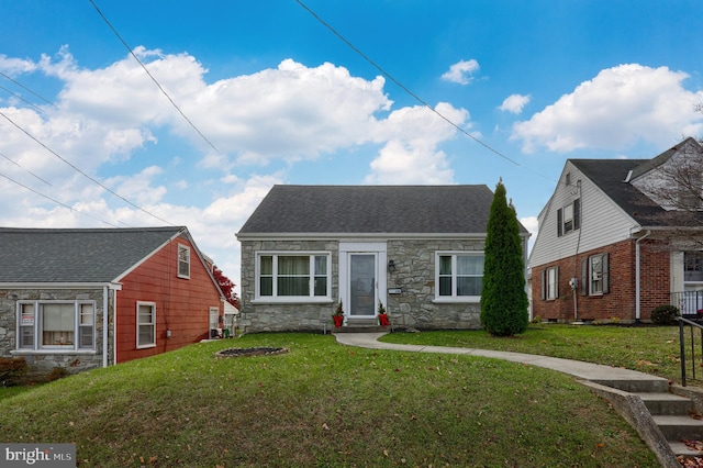 view of front of home featuring a front lawn