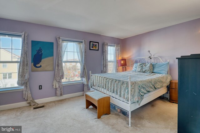 bedroom featuring carpet