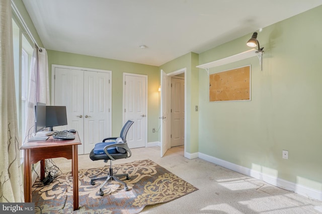 view of carpeted office space