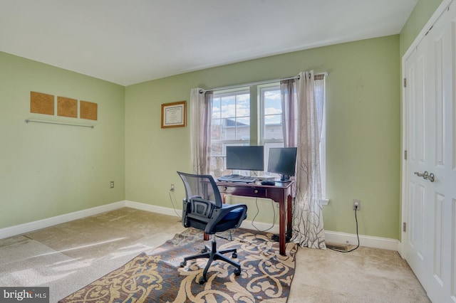 office space with light colored carpet