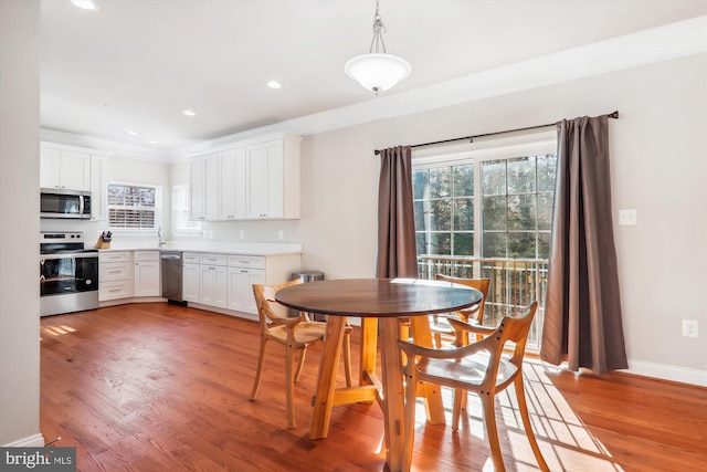 dining room featuring light hardwood / wood-style floors