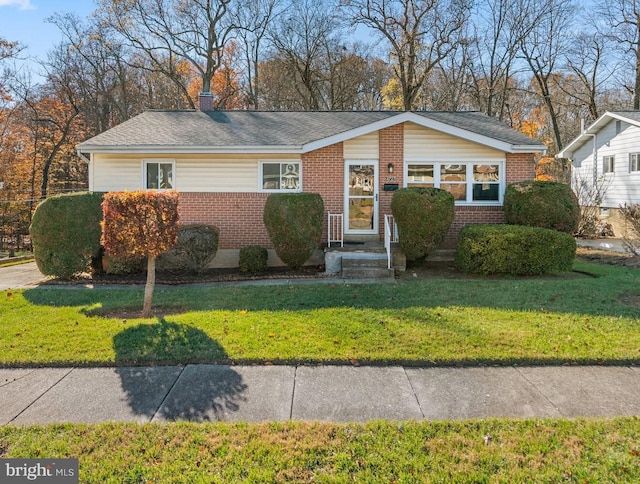 view of front of house with a front yard