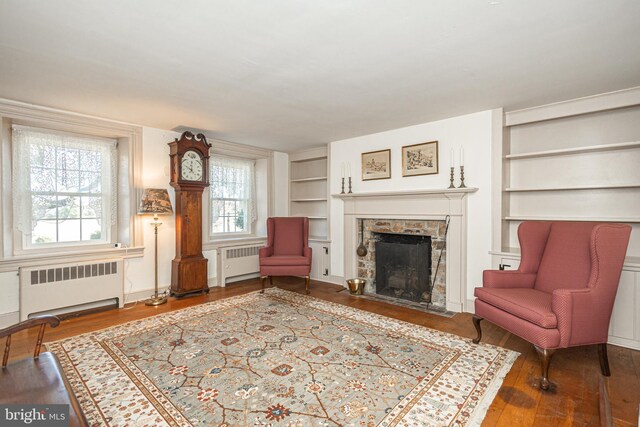 2209 Swamp Rd, Furlong, PA 18925 - home office with radiator, a chandelier, wallpapered walls, and dark wood-style flooring