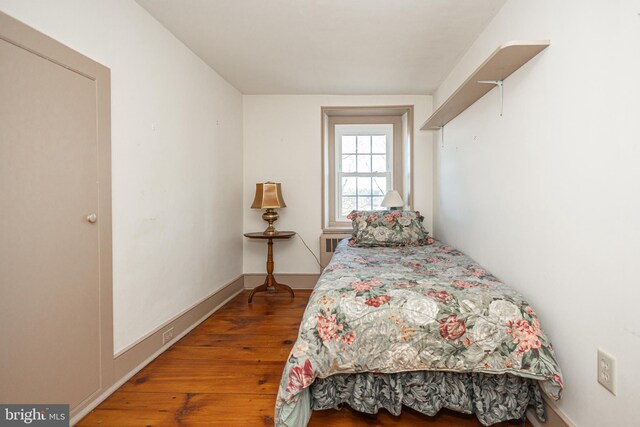 2209 Swamp Rd, Furlong, PA 18925 - bedroom featuring hardwood / wood-style flooring, a fireplace, and baseboards