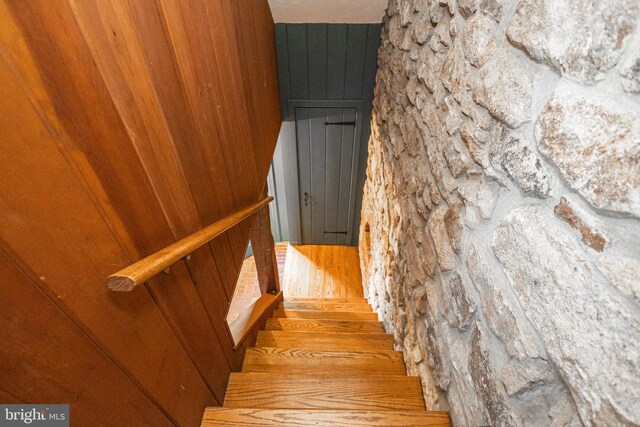 2209 Swamp Rd, Furlong, PA 18925 - living area featuring light wood-style floors, a stone fireplace, and beamed ceiling