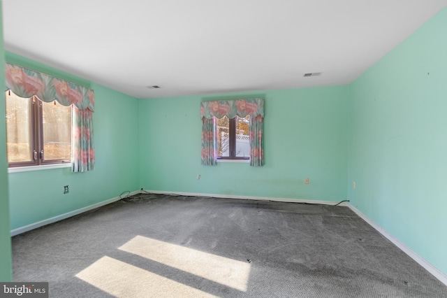 view of carpeted spare room