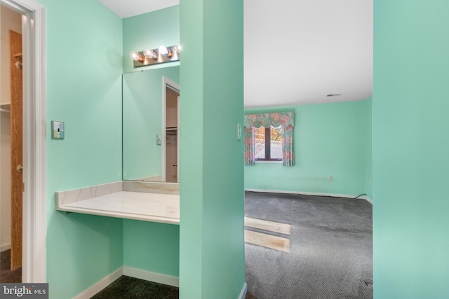 bathroom featuring baseboards