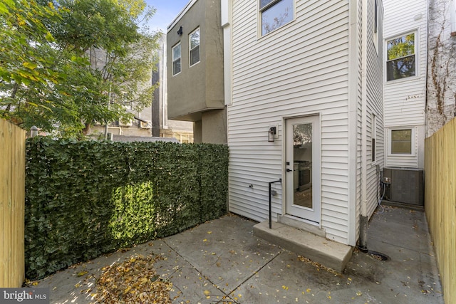 doorway to property with central AC