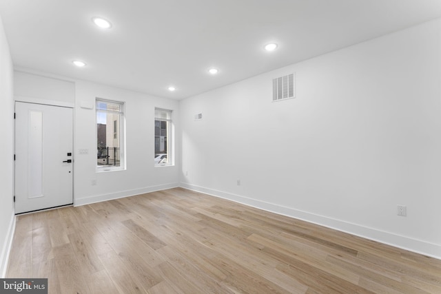 foyer with light hardwood / wood-style floors