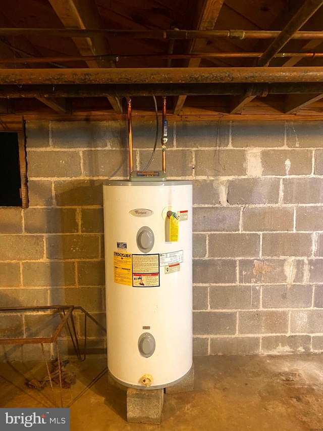 utility room with water heater