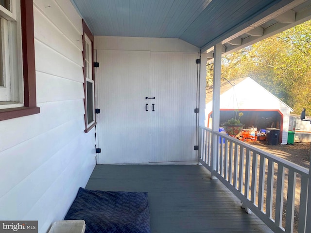 entrance to property featuring a porch