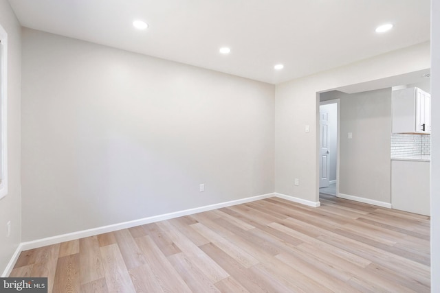 empty room with light wood-type flooring