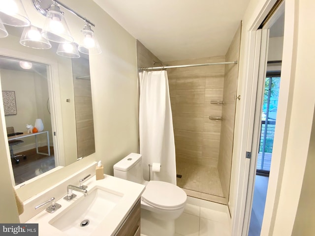 bathroom featuring tile patterned flooring, vanity, a shower with shower curtain, and toilet