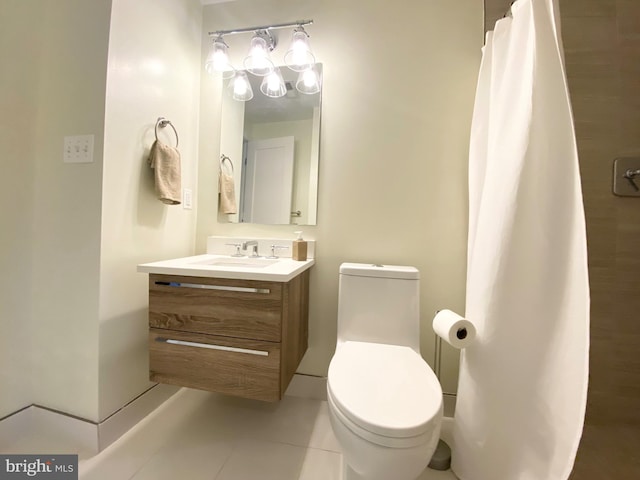 bathroom with tile patterned floors, vanity, curtained shower, and toilet