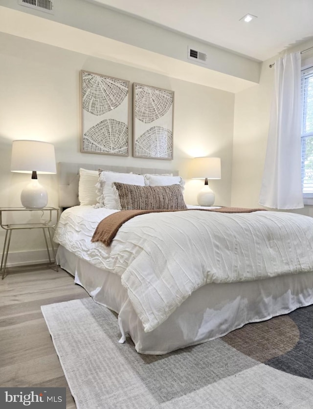 bedroom with light wood-type flooring