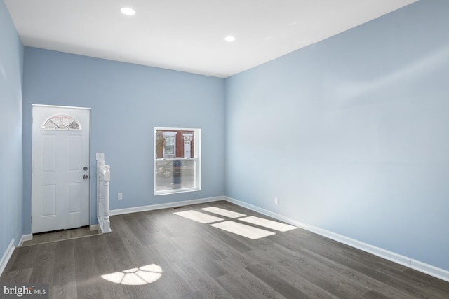 foyer entrance featuring dark hardwood / wood-style flooring