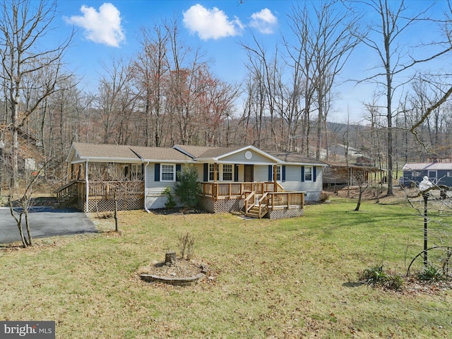 174 Robin Ln, Harpers Ferry, WV 25425 - manufactured / mobile home with a porch and a front yard