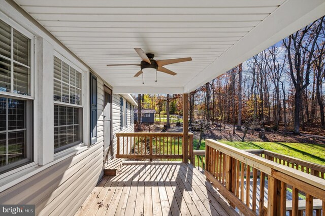 wooden terrace with ceiling fan