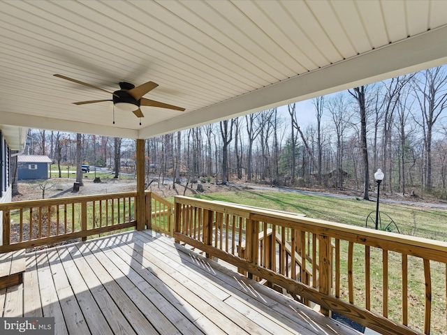 174 Robin Ln, Harpers Ferry, WV 25425 - wooden terrace featuring ceiling fan, view of wooded area, and a lawn