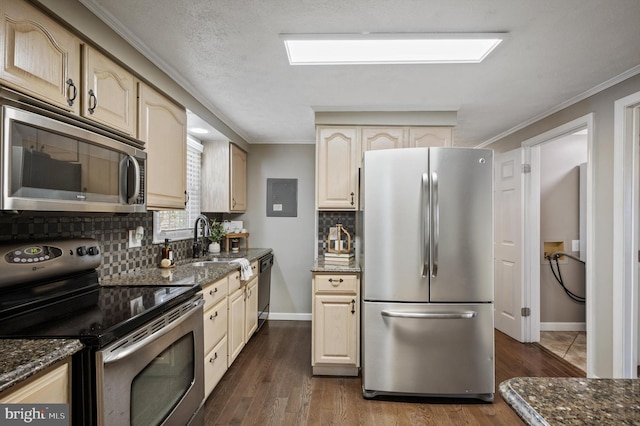 174 Robin Ln, Harpers Ferry, WV 25425 - kitchen featuring stainless steel appliances, tasteful backsplash, dark stone countertops, and crown molding