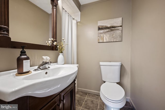 174 Robin Ln, Harpers Ferry, WV 25425 - full bath featuring baseboards, toilet, vanity, ornamental molding, and tile patterned flooring