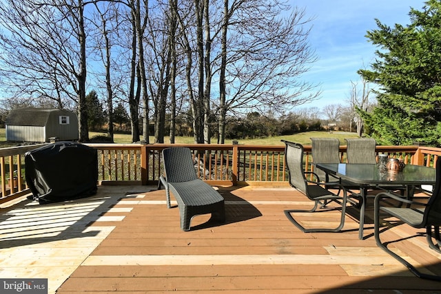 deck featuring a storage shed