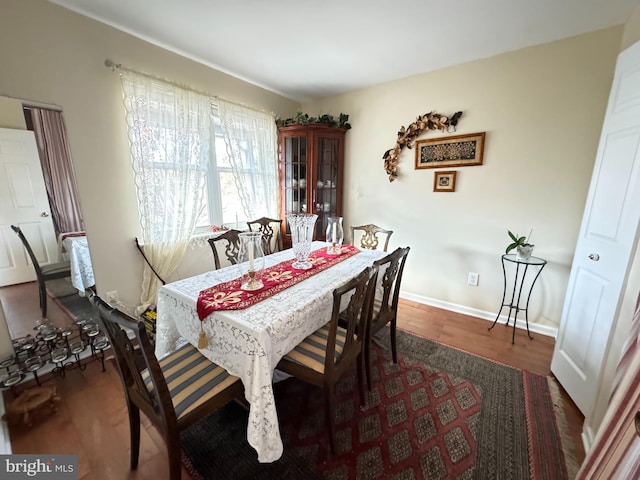 dining room featuring dark hardwood / wood-style floors