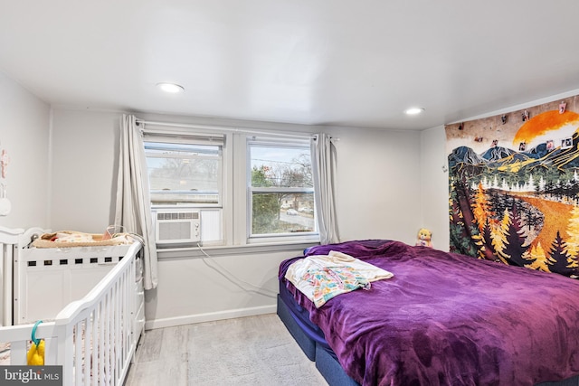 bedroom with light hardwood / wood-style flooring