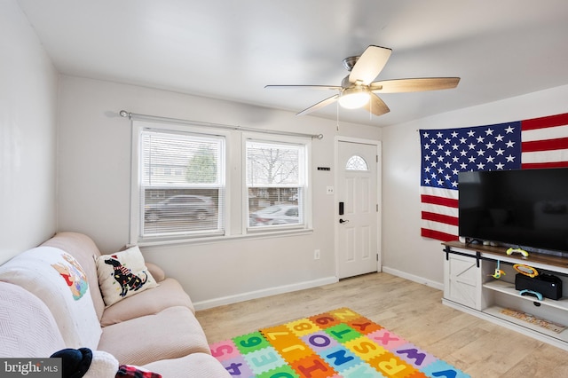 interior space featuring ceiling fan and light wood-type flooring