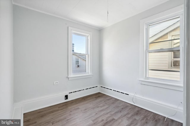 empty room featuring hardwood / wood-style flooring